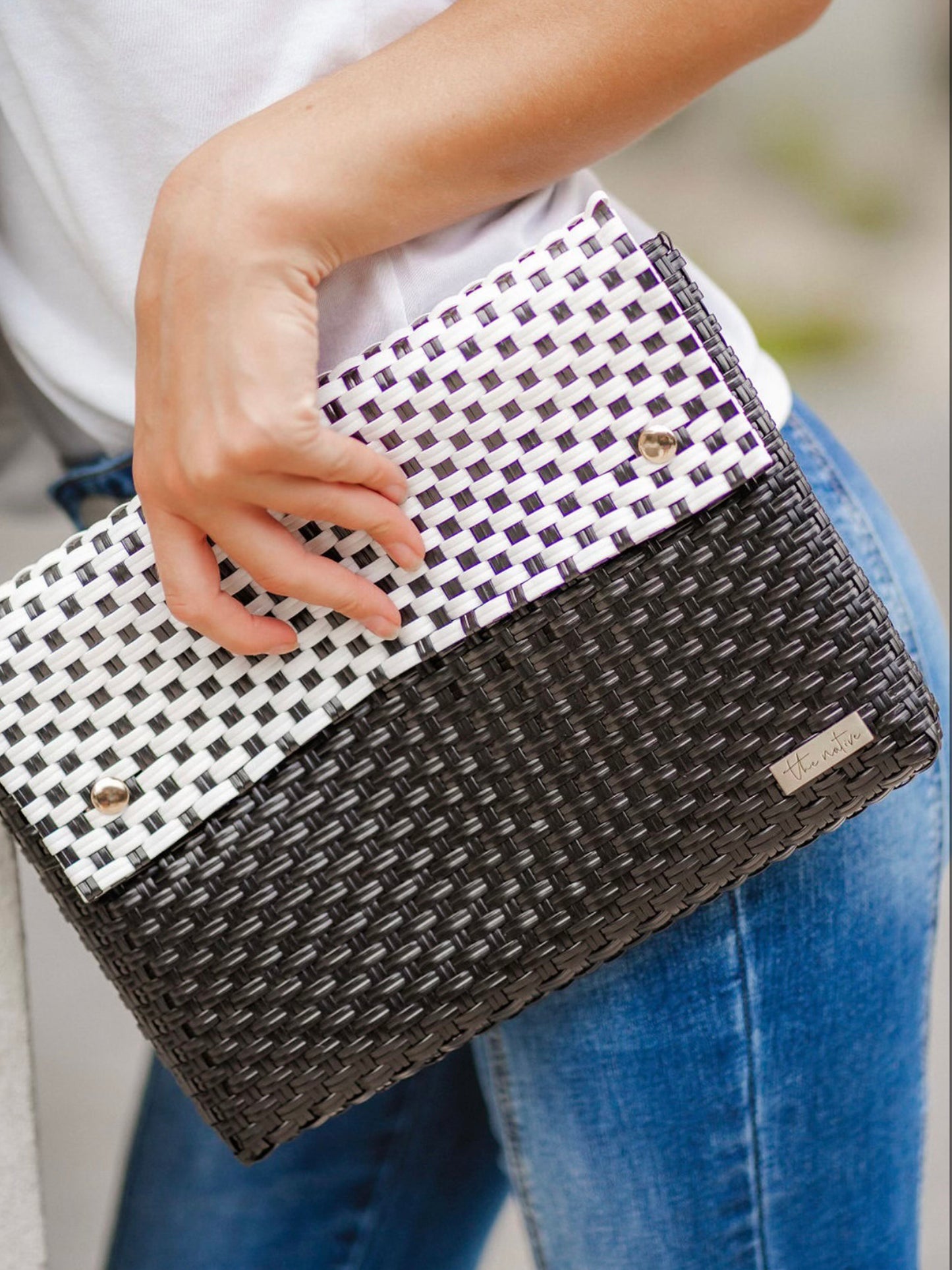 playa clutch black and white lifestyle
